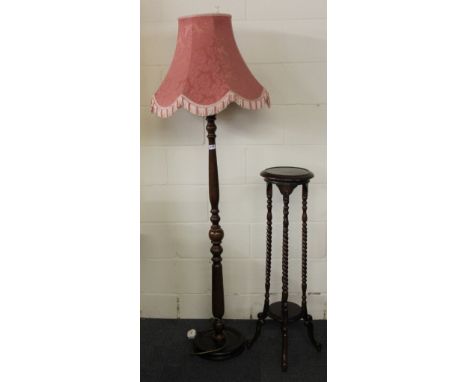 A mahogany standard lamp and plant stand