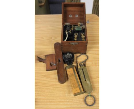 A cased instrument, compass etc
