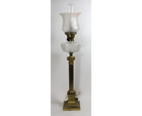 A brass and glass column oil lamp converted to electricity H 92cm