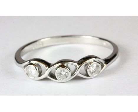 A 9ct white gold and 3 diamond ring (N)