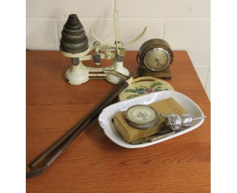 A kitchen scale clock etc