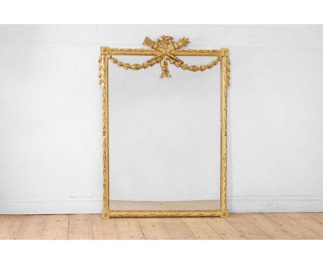 A Louis XVI-style giltwood pier mirror,  late 19th/early 20th century, Italian, with a neoclassical crest and foliate swag de