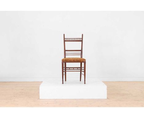 A late Victorian Aesthetic Movement walnut side chair attributed to H W Batley, c.1880, with pierced bobbin-turned detail, th