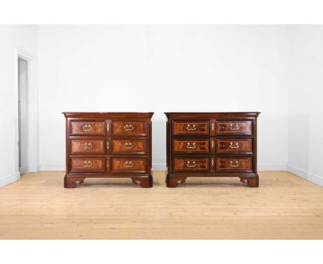 A matched pair of walnut and marquetry commodes or cassettoni, mid-18th century, North Italian, each with a canted rectangula