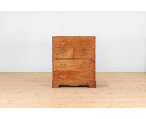 A small teak campaign chest, first half of the19th century, Anglo-Indian, the rectangular top above a secretaire drawer with 