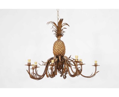 A large gilt toleware chandelier, c.1920s, French, in the form of a pineapple issuing ten scrolling branches,81cm diameter63.