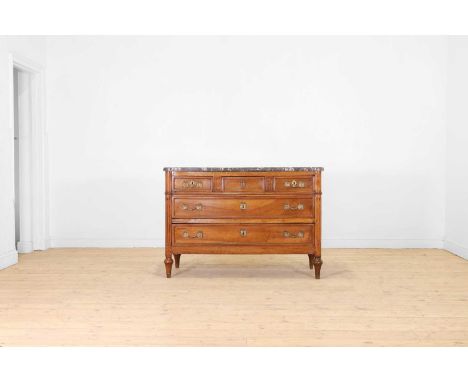 A Louis XVI provincial walnut commode, late 18th century, French, with a veined grey marble top, above three short and two lo