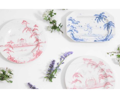 A group of tin-glazed dishes by Isis Ceramics, late 20th century, comprising two pink and white circular chargers, and an oct