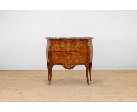 A Louis XV kingwood, tulipwood and marquetry commode by Pierre Roussel, mid-18th century, French, of serpentine outline, the 
