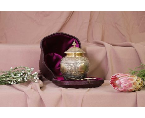 A Victorian silver-gilt tea caddy and spoon, by John, Edward, Walter &amp; John Barnard (Barnard &amp; Sons Ltd.), London 187