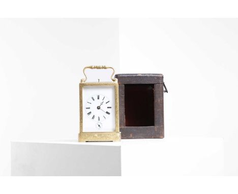 A gilt-brass and bevelled glass carriage clock, 19th century, French, the dial inscribed 'Breguet à Paris', the two-train mov
