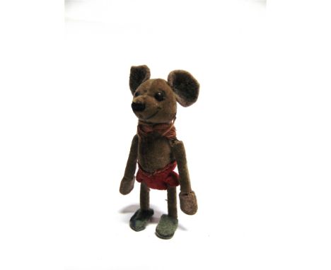 A TOY MOUSE probably by Schuco, with felt ears, metal boot button style eyes, a velvet covered jointed body, and felt shoes, 