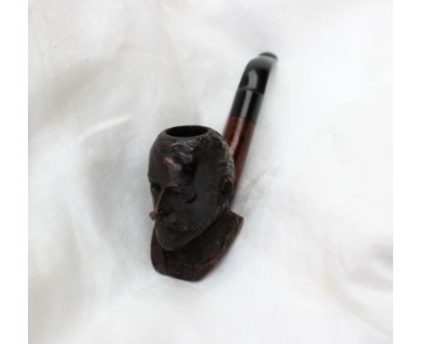 A briar pipe carved as the portrait of King Edward VII 