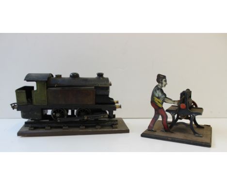 A Bowman O gauge 0-4-0 live steam tank locomotive, LNER, no. 300, mounted on a wooden base, together with a model printing pr