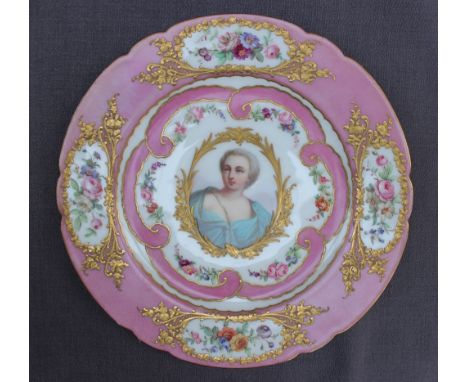A Sevres style porcelain plate painted to the centre with a portrait of the Duchesse de Chateauroux, to a pink and floral bor