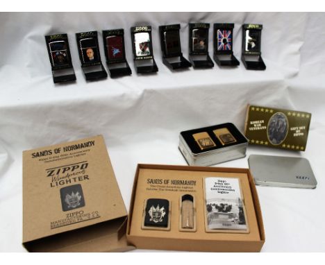Zippo - Sands of Normandy, boxed lighter with a vial of sand, together with a Korean War Veterans two lighter Zippo gift set 