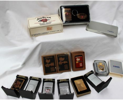Zippo - A lighter decorated to advertise Jim Bean, with a matching key ring, in a tin box, together with ten other Zippo ligh