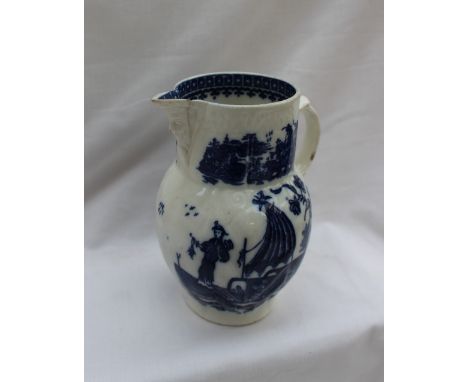 An 18th century Caughley Salopian blue and white porcelain milk jug, with mask spout, moulded leaf body and scroll handle, de