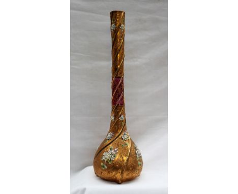 A Victorian ruby and gilt glass large single stem vase with raised scrolls and applied flowers, 41cm high 