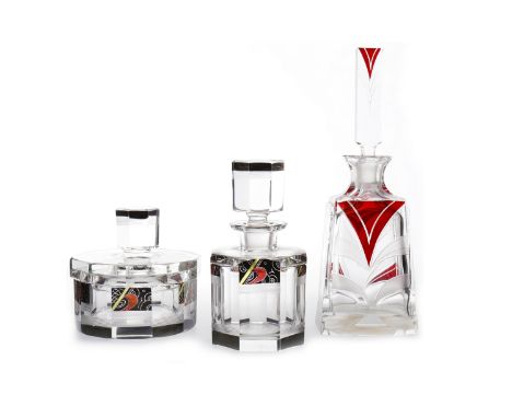 OCTAGONAL PERFUME BOTTLE AND STOPPER OF ART DECO DESIGNdecorated with coloured panels on a black ground with cut line borders