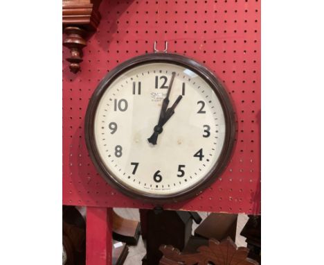 A vintage Smiths Bakelite cased dial clock, Arabic numerated 