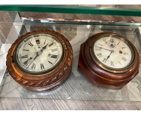 A rope twist surround wall clock together with an octagonal cased example (2) 