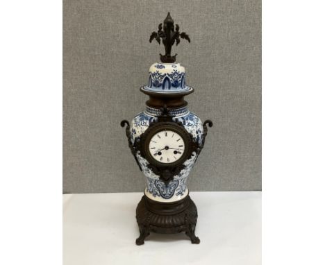 A modern Dutch style vase form clock with Roman dial, 56cm tall x 23cm wide, with pendulum 