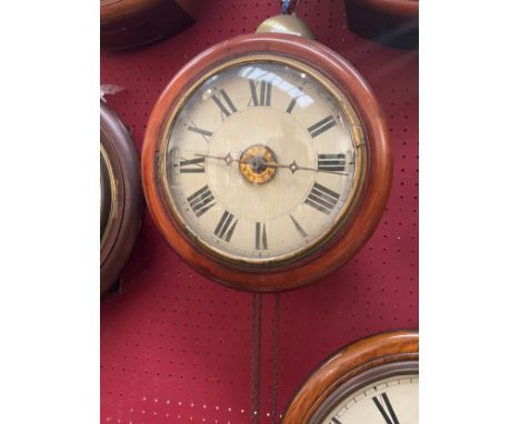 A Victorian postman's alarm clock with 9'' dial, Roman numerated, with pendulum and one weight 