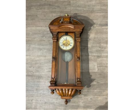 A late 19th Century Vienna wall clock with two train movement, painted Art Nouveau panels, 99cm tall x 36cm wide, with pendul