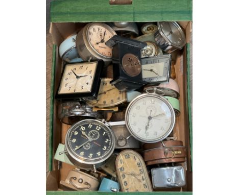 A box of alarm clocks and compact clocks 