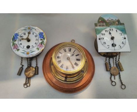 Three miniature wall timepieces, one of ship's clock form, the others enamelled 