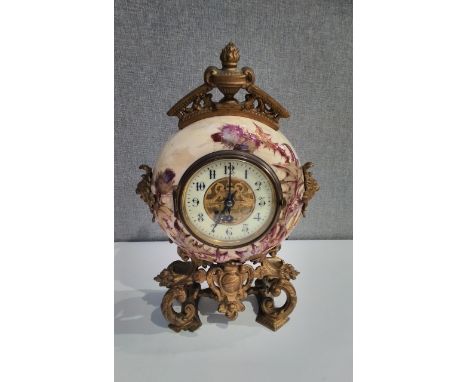 A French ceramic and ormolu mantel clock, Arabic dial, thistle decoration, 38cm tall 