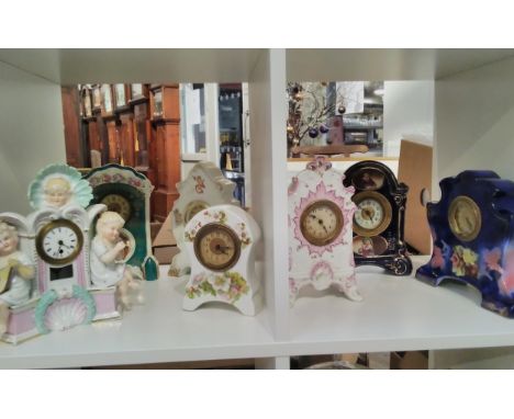 Seven various ceramic mantel clocks 