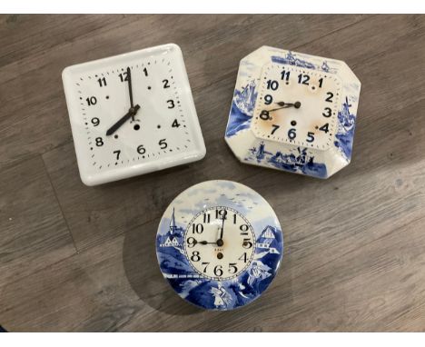 Five Continental ceramic wall clocks, two in blue and white including Dutch mill scene, Arabic dials 