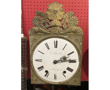 A French comtoise clock by A Borredon, the enamel Roman dial with brass fretwork top case, on later scrolled metal brackets, 