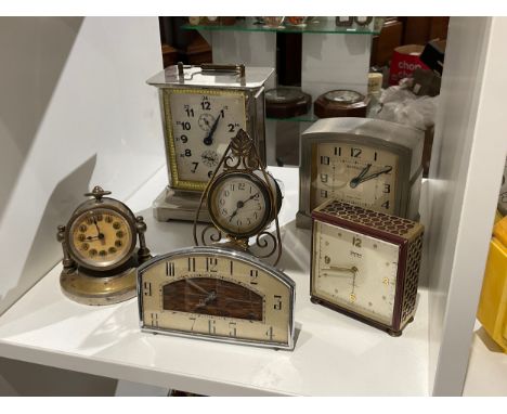 Six various clocks including German carriage style clock with Silent Night chime 