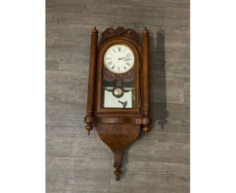 A late 19th Century mahogany wall-hanging clock with compensatory pendulum, new face, also two keys 