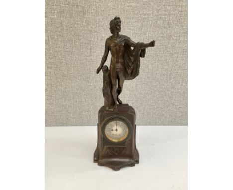 An Art Deco bronzed spelter figural clock with Romanesque figure, Arabic dial, 31cm tall 