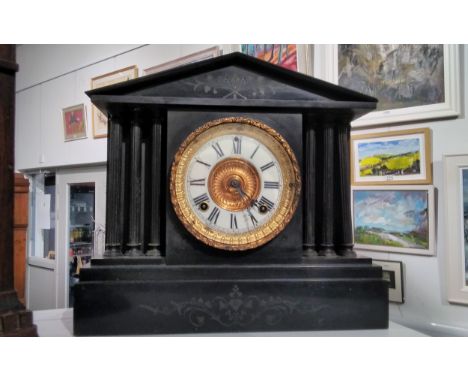 A Victorian black slate mantel clock of architectural form, gilt brass surround 