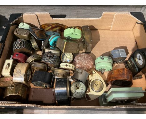 A box of compact clocks including alarm and desk clocks 