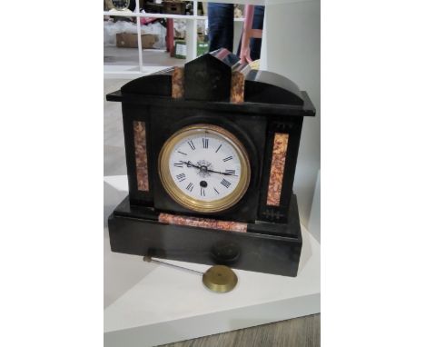 A circa 1900 black slate and marble mantel clock with Roman dial, architectural form, with pendulum 