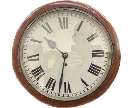 A circa 1900 dial clock, 11.5” dial, single fusee mechanism, with pendulum 