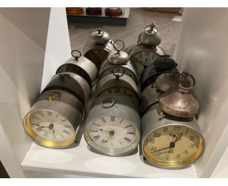 A quantity of vintage clocks including alarm, metallic cased 