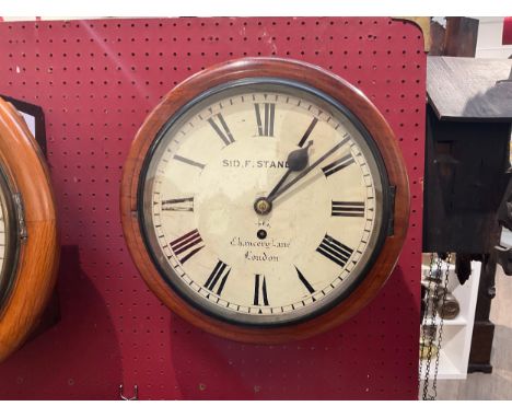 A Victorian Sid. F. Stanley, Chancery Lane, London, walnut cased dial clock, Roman painted dial 19.5” diameter, single fusee 
