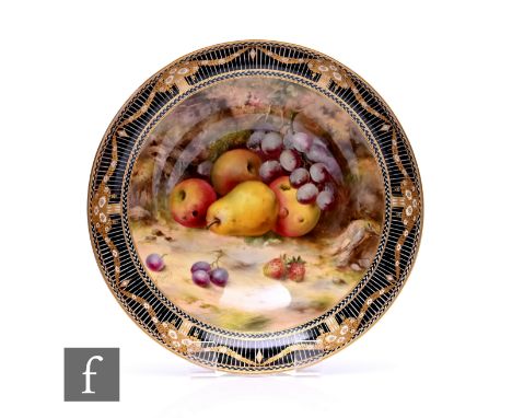 A Royal Worcester fruit painted bowl by Frank Roberts, circa 1918, decorated with pears, apples, grapes and strawberries on a