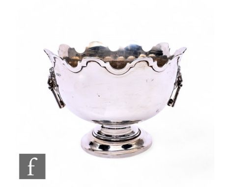 A hallmarked silver twin handled small Monteith bowl of plain form, weight 16.8oz, Sheffield 1914, Walker Hall.