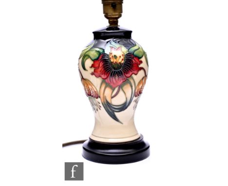 Nicola Slaney for Moorcroft Pottery, an Anna Lily pattern lamp base, circa 2011, of inverse baluster form, tubeline decorated