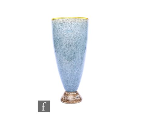 An American Pheonix Glass vase, circa 1980 of footed flared form, mottled grey/blue with pale amber rim, on flared foot with 
