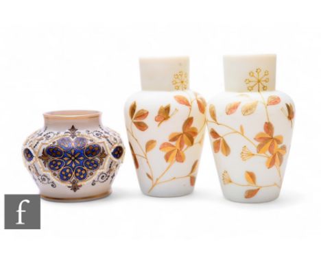 A pair of late 19th Century&nbsp; Harrach vases, of shouldered form with high drawn collar, gilt and bronze enamelled floweri