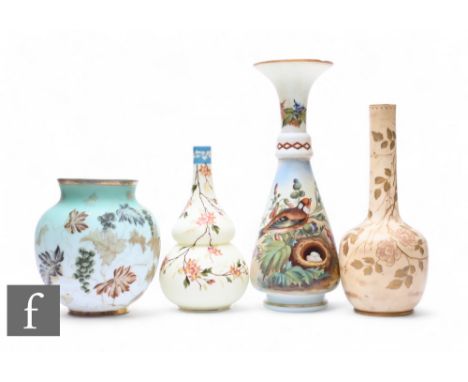 A late 19th Century enameled opaline glass vase, of inverse baluster form with knopped neck and flared rim, decorated with ne